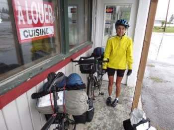 Huddling under the porch of an abandoned restaurant 