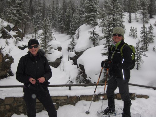 Patti and Fran overlooking a frozen waterfall