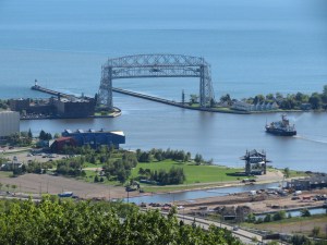 Coast Guard ship going under the bridge