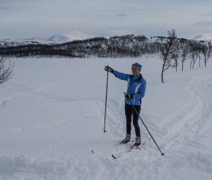 Molly skiing by the lake