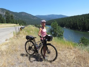 Molly cycling Clark Fork River