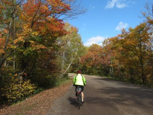 Myra cycling away from Hawk's Ridge