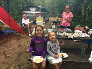 Family camping breakfast