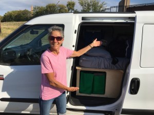 Molly showing campervan storage