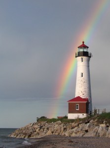Crisp Point Lighthouse with rainbow