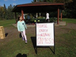 Mya and the Pop Up Park sign