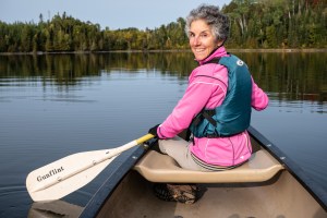 Molly canoeing Gunflint Lake