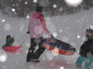 Karen and kids sledding in blizzard