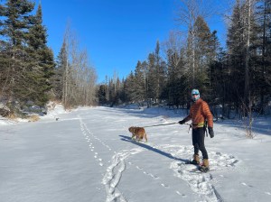 Erik and Finley upstream on Sucker River